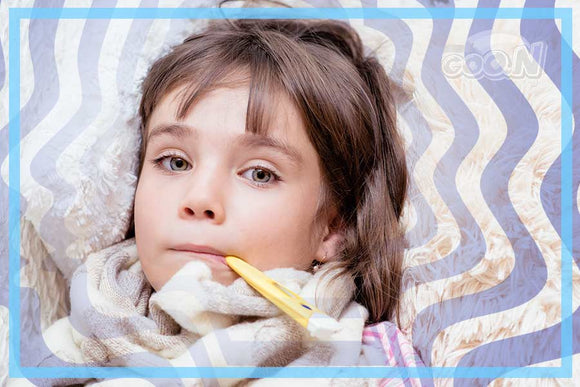 Common cold prevention. Helping a baby with a runny nose and cough